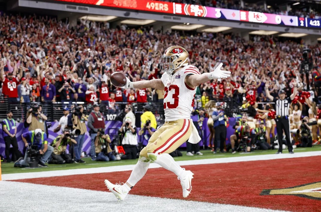 San Francisco 49ers running back Christian McCaffrey runs for a touchdown during Super Bowl LVIII on Sunday, Feb. 11, 2024, in Las Vegas, Nevada. NFL/Ryan Kang